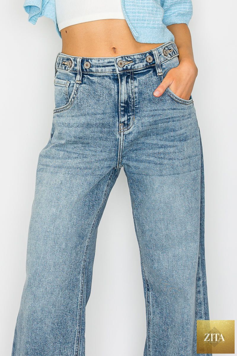 Artemis Vintage high-rise baggy jeans with adjustable waistband and wide-leg fit, showcasing denim texture and relaxed style.