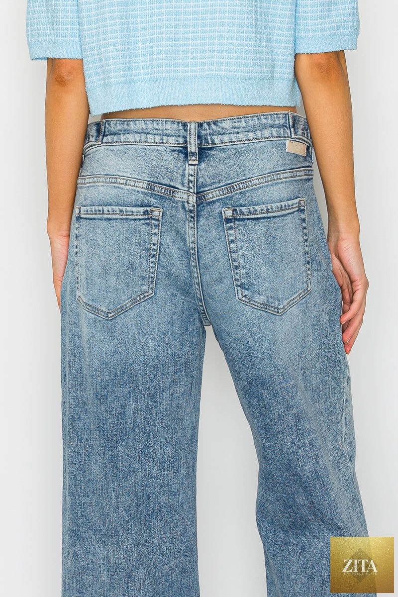 Artemis Vintage high-rise baggy wide jeans with adjustable waistband, showcasing relaxed fit and classic denim style.