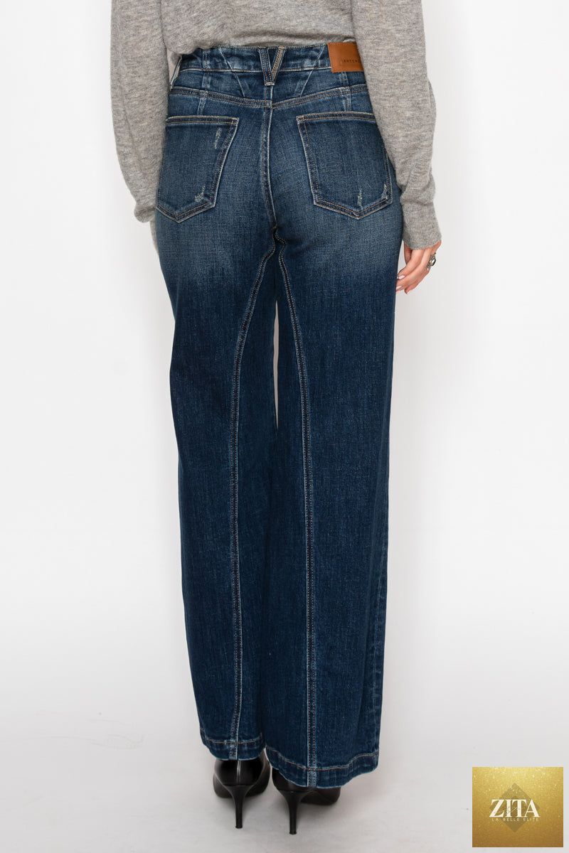 Artemis Vintage hybrid stretch ripped ultra high rise relaxed flare jeans with distressed details and a casual fit.