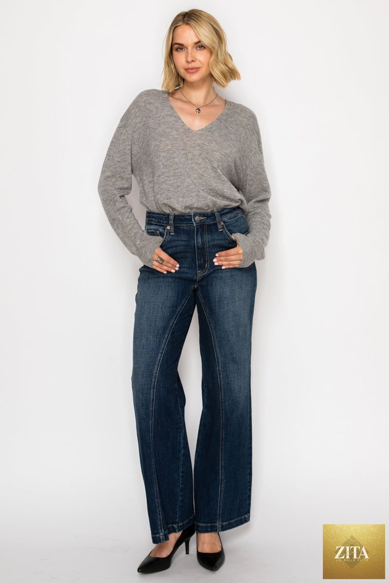 Artemis Vintage hybrid stretch ripped ultra high rise relaxed flare jeans with distressed detailing and frayed hem.