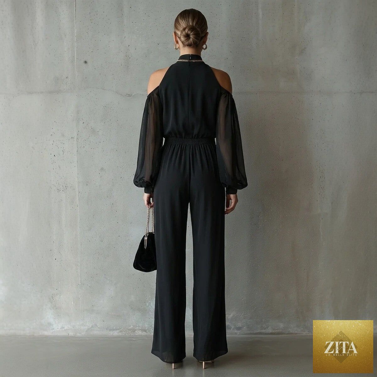 Black embroidered women's long-sleeve wide-leg jumpsuit by Zita La Belle Elite featuring casual wear style and elegant embroidery details.