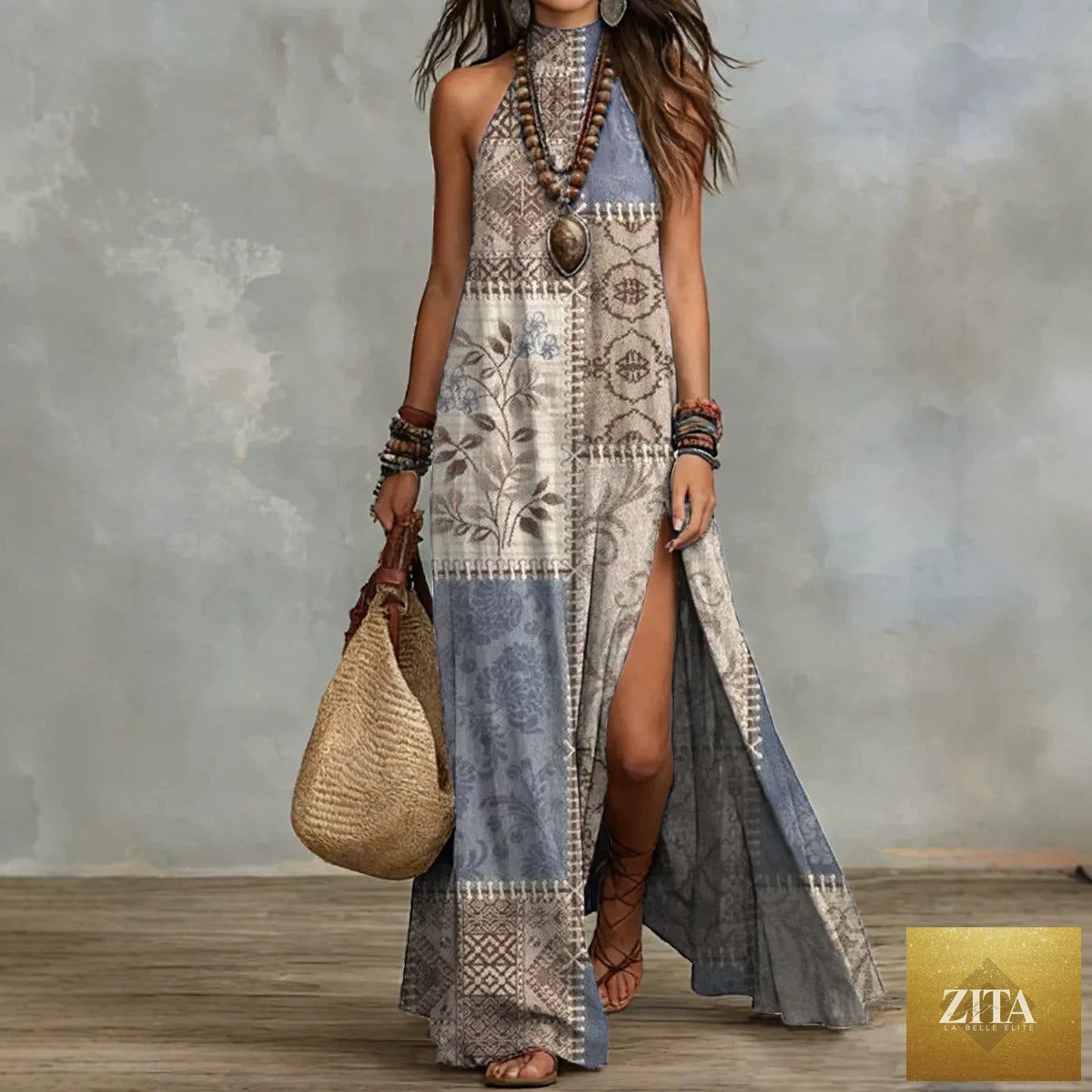 Women's sleeveless floral print maxi dress by Zita La Belle Elite, showcasing a split design and vibrant floral pattern.
