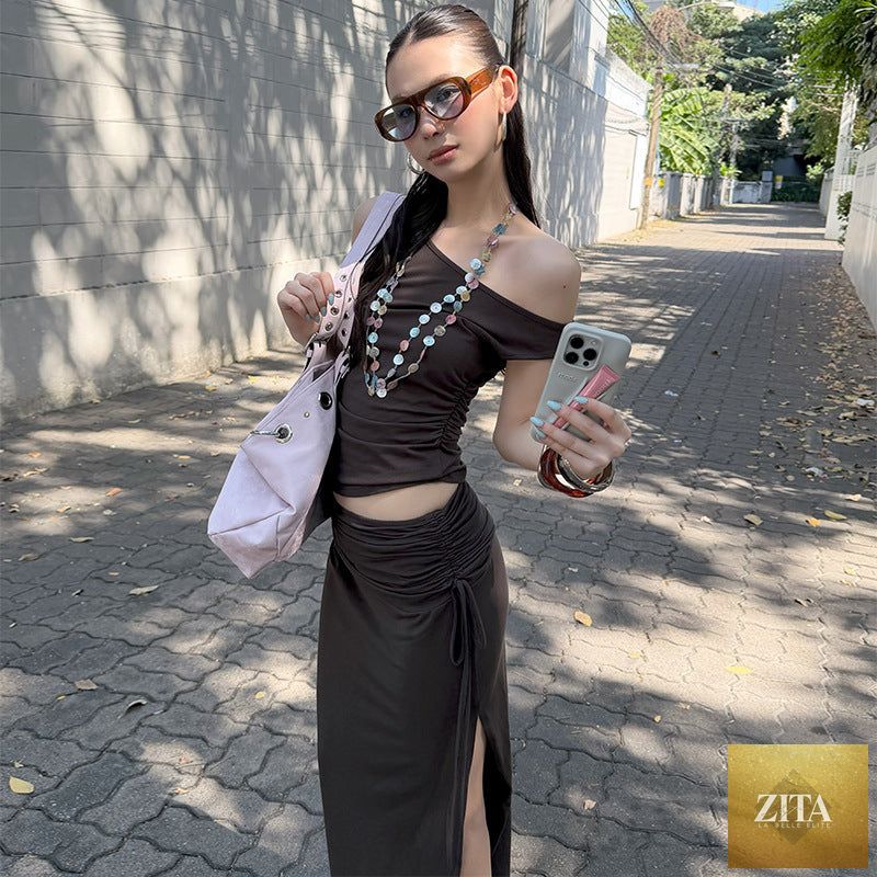 Women's off-shoulder vest and skirt two-piece casualwear set by Zita La Belle Elite, featuring a stylish off-shoulder design and coordinated look.