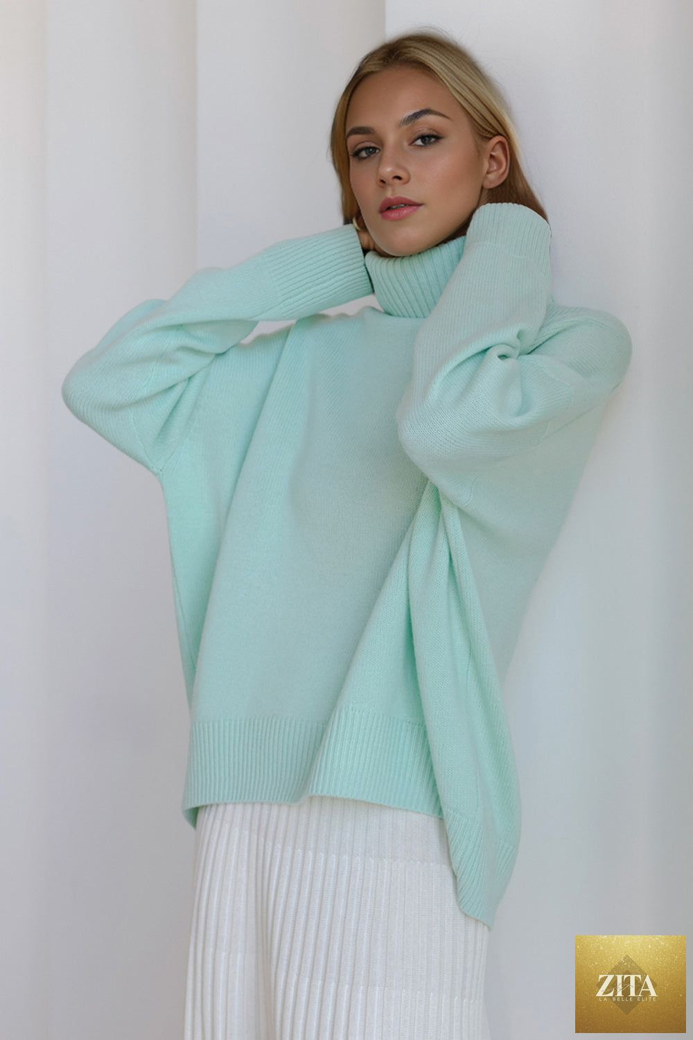 ShopBasicbae basic beige turtleneck sweater with dropped shoulders and long sleeves, casual and comfortable for everyday wear.