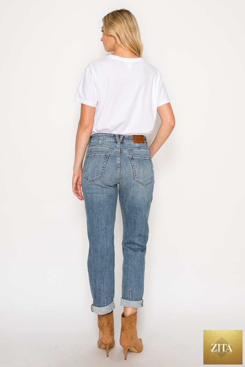 Light blue mid-rise modern boyfriend jeans by Artemis Vintage with relaxed fit and classic five-pocket design.