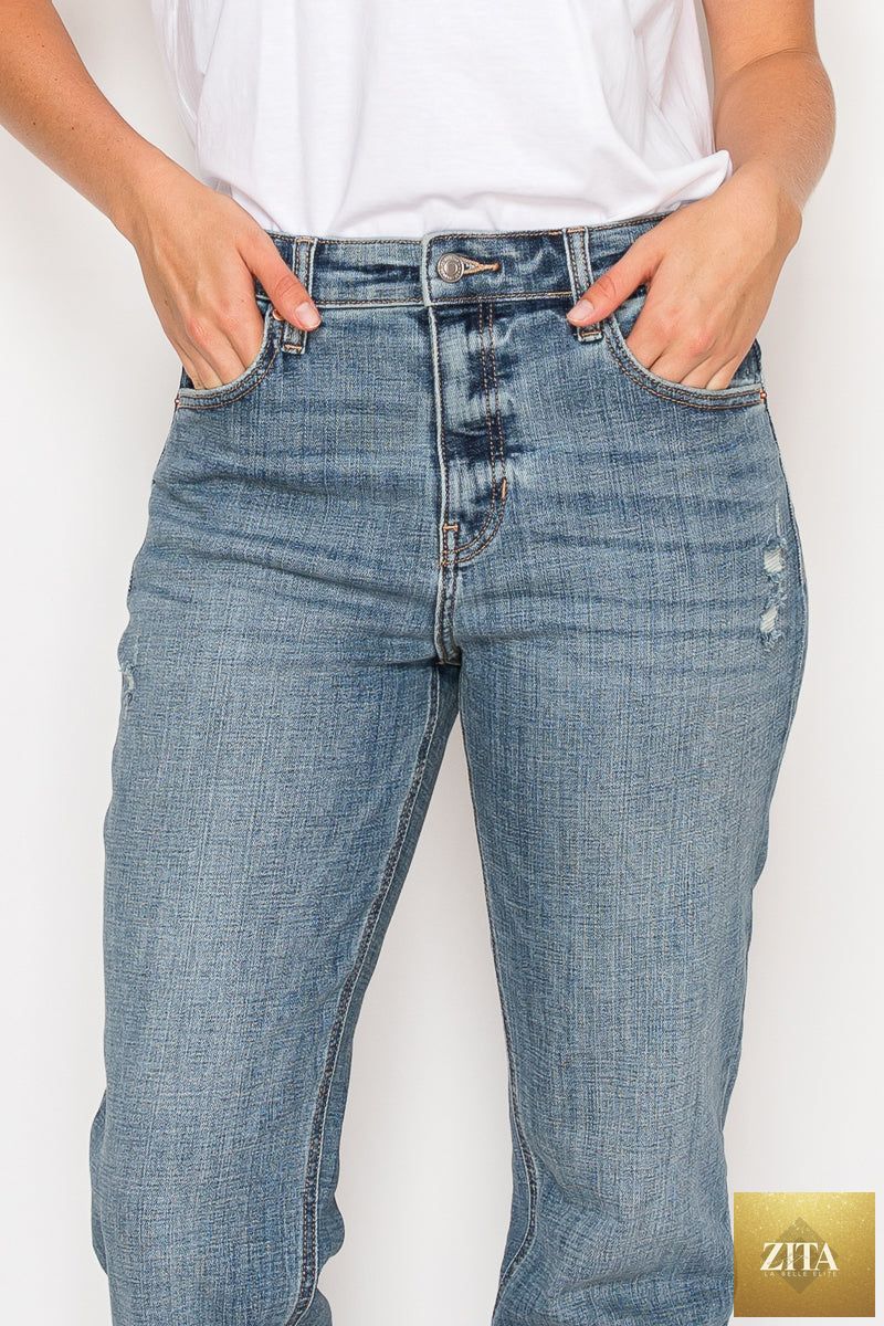 Mid-rise modern boyfriend jeans by Artemis Vintage, showcasing relaxed fit denim with classic five-pocket styling and light wash.