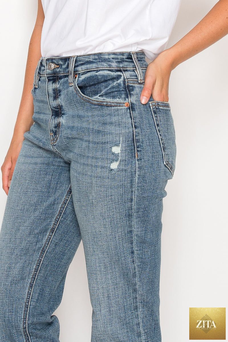 Mid-rise modern boyfriend jeans by Artemis Vintage, featuring relaxed fit and classic denim style.