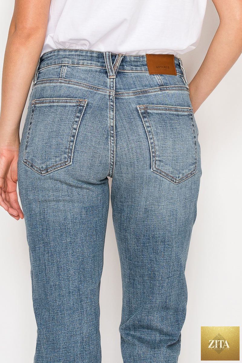 Mid rise modern boyfriend jeans by Artemis Vintage, showcasing a relaxed fit with classic denim details and casual style.