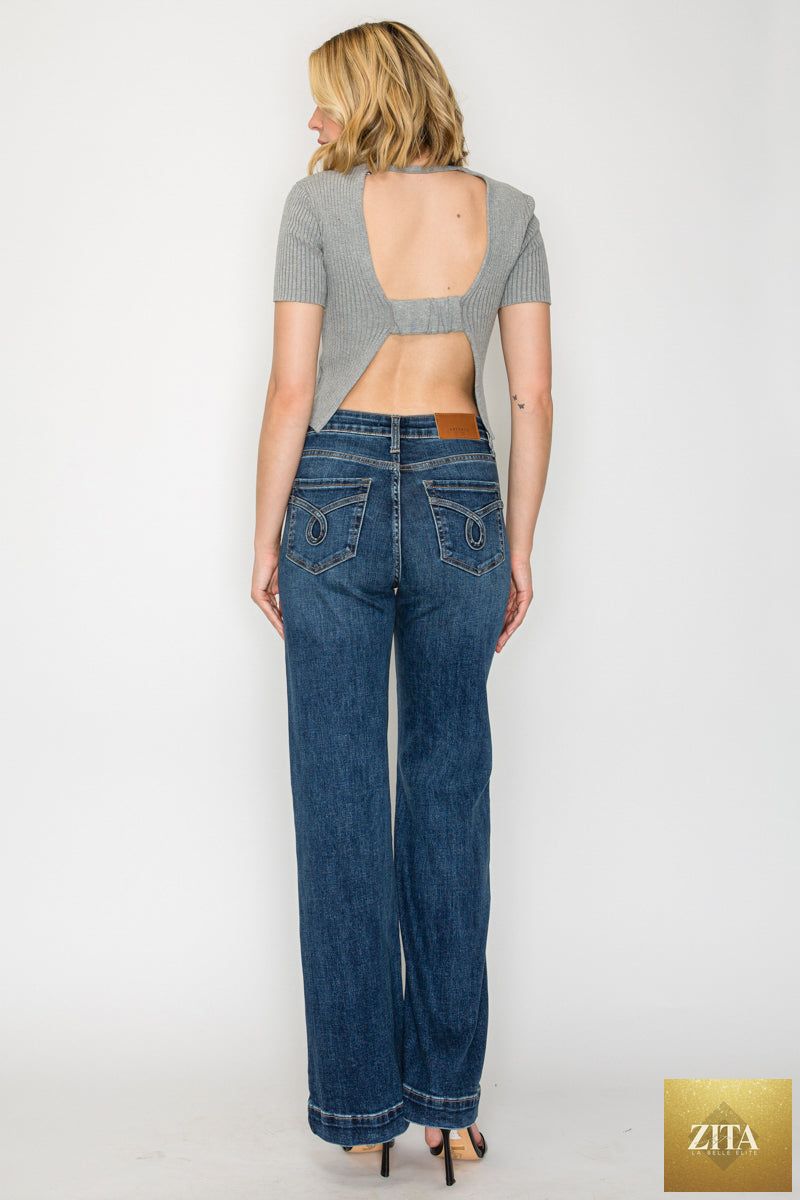 Josephine Tummy Control High Rise Relaxed Holly Flare Jeans by Artemis Vintage, showcasing fitted waist and flowing flare legs.