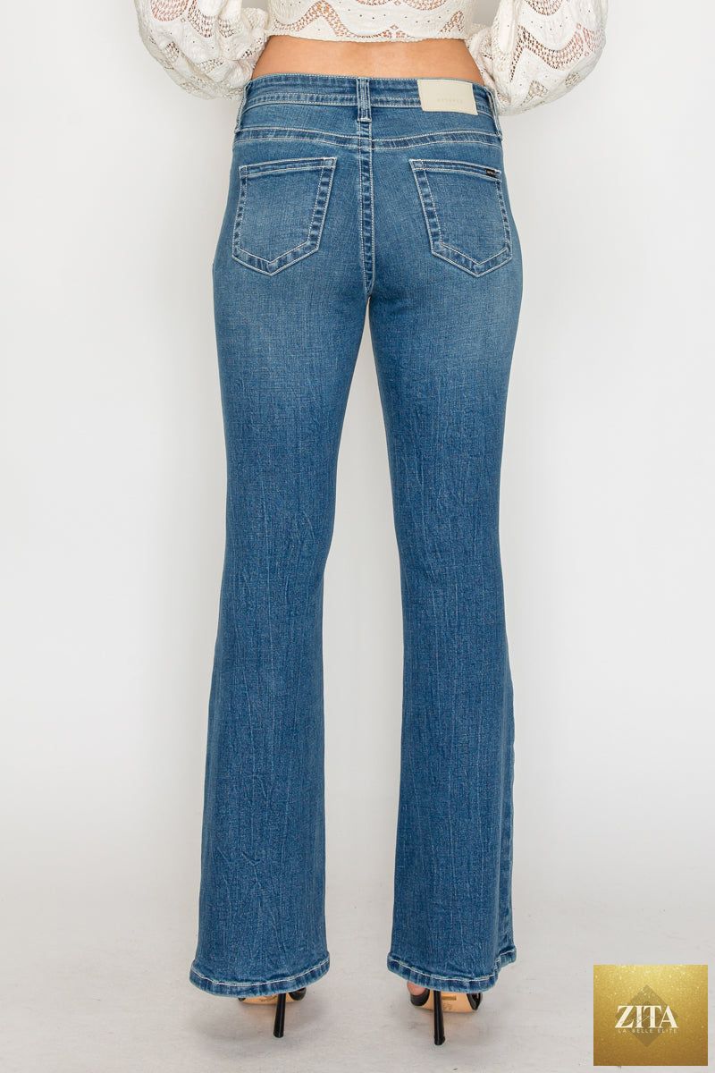 Artemis Vintage Stevie Tummy Control High Rise Slim Flare Jeans in medium wash, showcasing fitted waist and flare leg style.