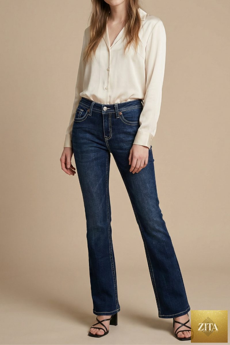 Dark wash Stevie Tummy Control high-rise slim flare jeans by Artemis Vintage, featuring a fitted waist and flared leg design.