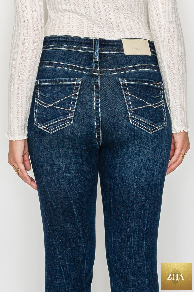 Dark wash Stevie Tummy Control high-rise slim flare jeans by Artemis Vintage, showcasing a fitted waist and flared leg style.