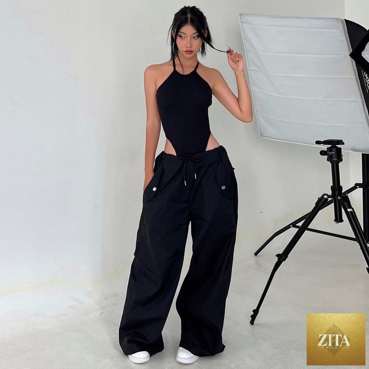Women's high-waist lace-up straight-leg cargo pants by Zita La Belle Elite, casual loose-fit design with front and side pockets.