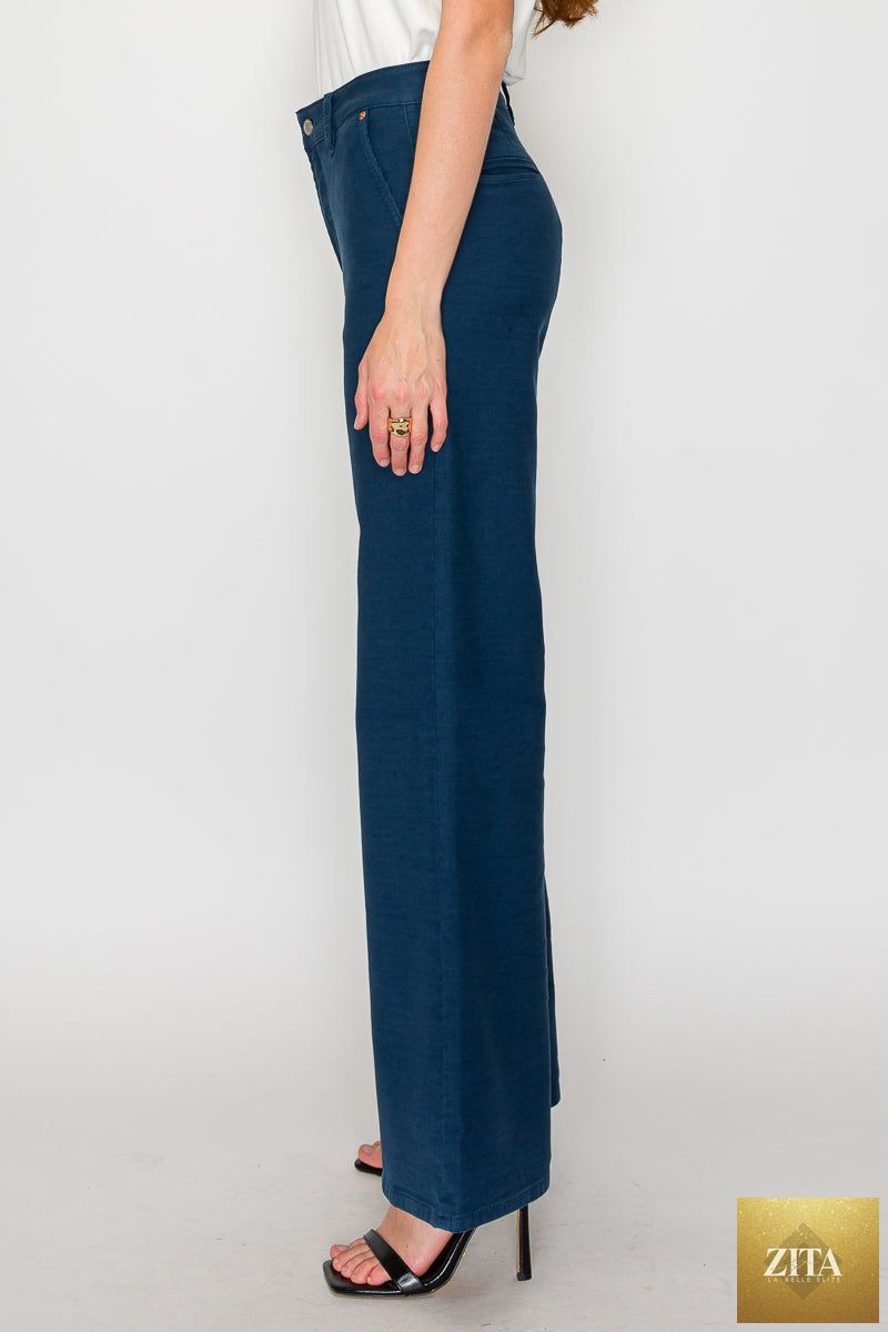 Anastasia high rise wide flare jeans by Artemis Vintage, showcasing a fitted waist and flowing wide leg silhouette.