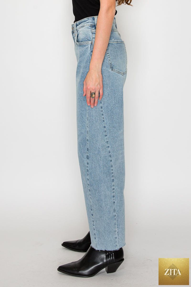 Blue Harlow high-waisted barrel jeans by Artemis Vintage, showcasing classic denim style and relaxed fit.