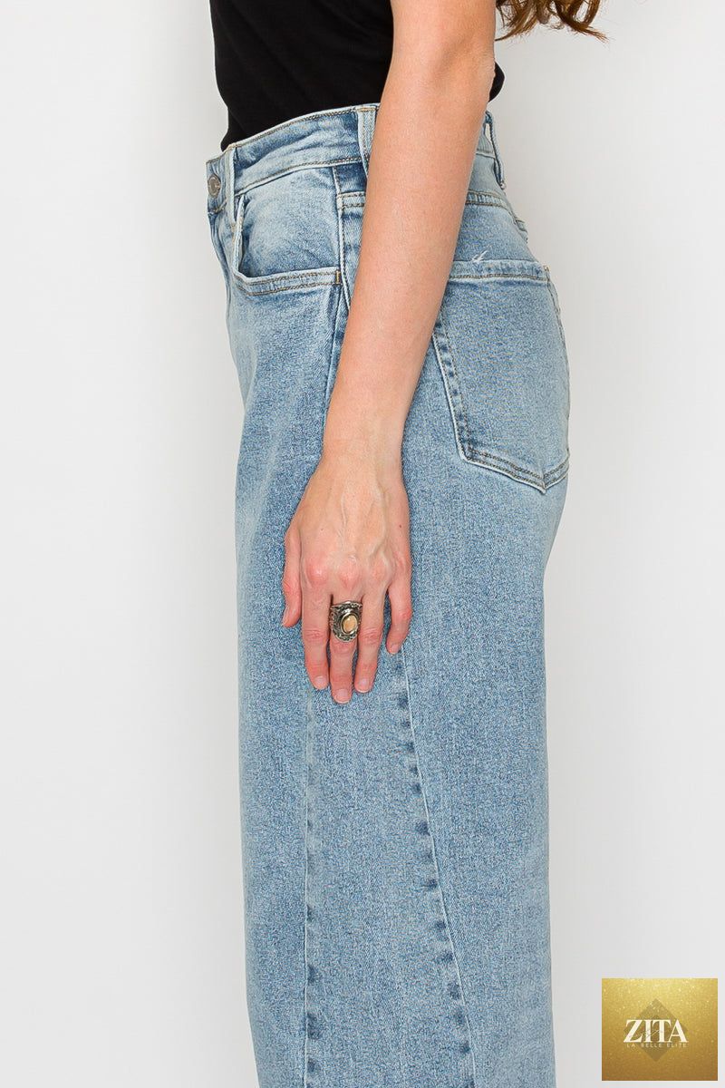 Blue Harlow high-waisted barrel jeans by Artemis Vintage, showing classic fit, denim texture, and stylish design.