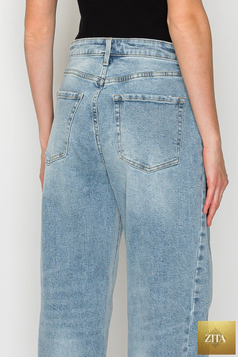 Blue Harlow high-waisted barrel jeans by Artemis Vintage, showcasing classic denim with a relaxed fit and vintage-inspired style.
