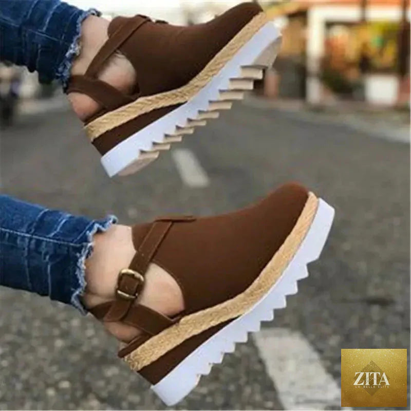Wedge heel platform women's shoes in black with ankle strap, stylish and comfortable for casual or dressy occasions.