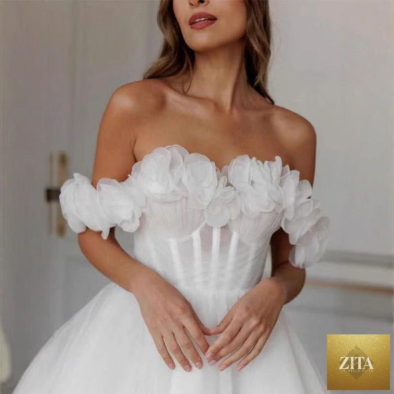 Lace off-shoulder mini wedding dress with fitted bodice and flared skirt, perfect for bridal occasions