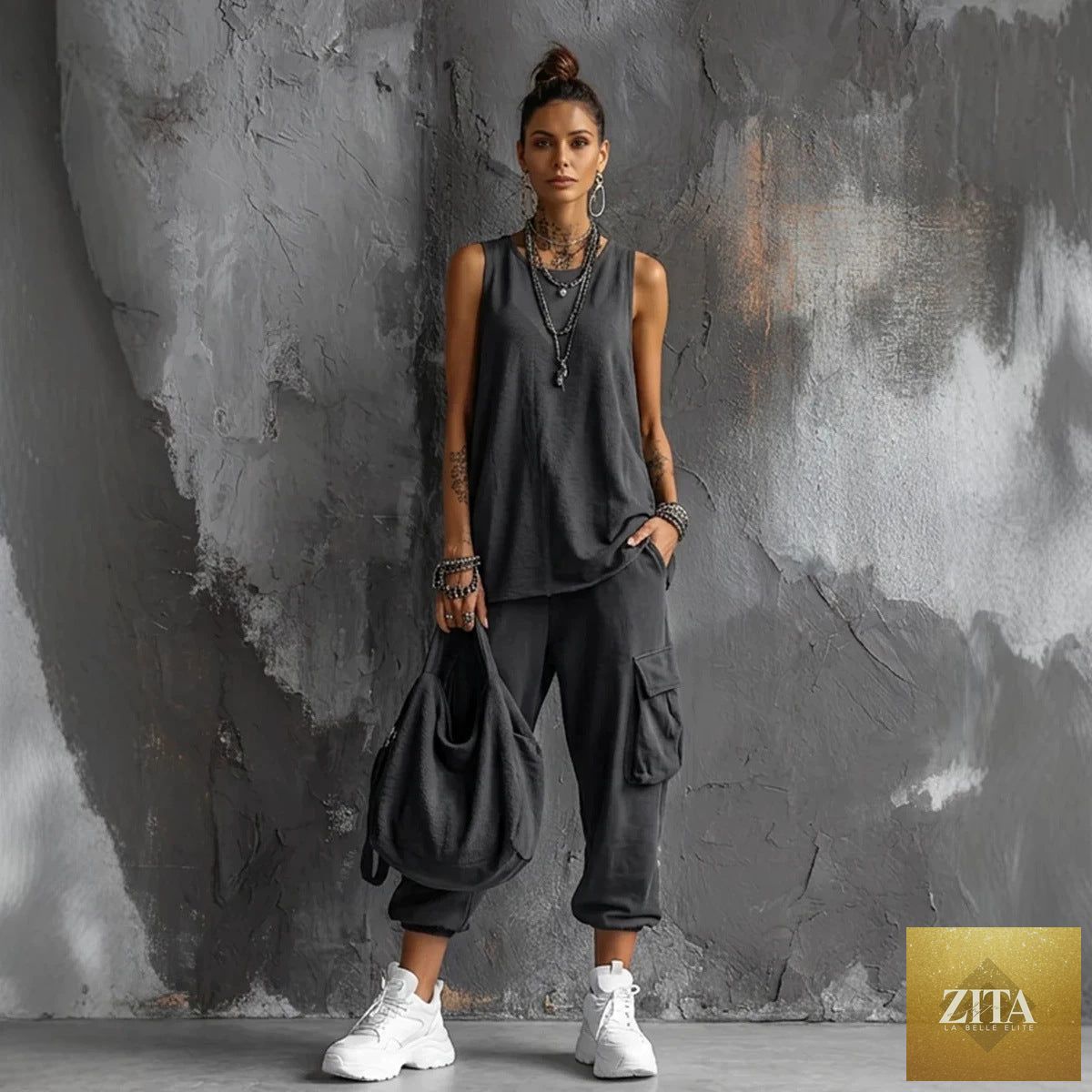 Women’s sleeveless tank top and cropped ankle pants set by Zita La Belle Elite, featuring a stylish two-piece outfit in a vibrant color.