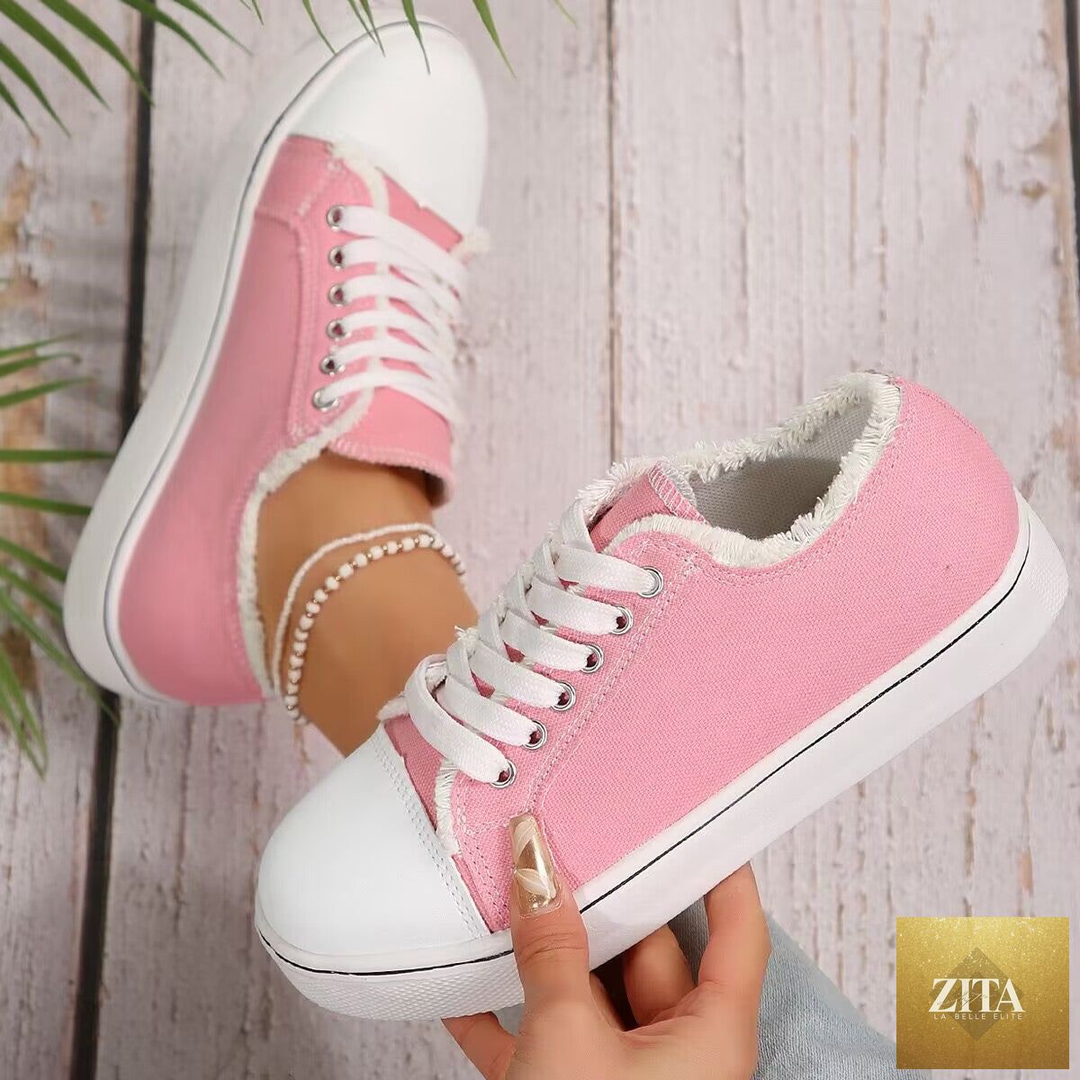 Women's lightweight lace-up canvas sneakers by FitiqueFit, low-top flat shoes with breathable fabric and casual style.