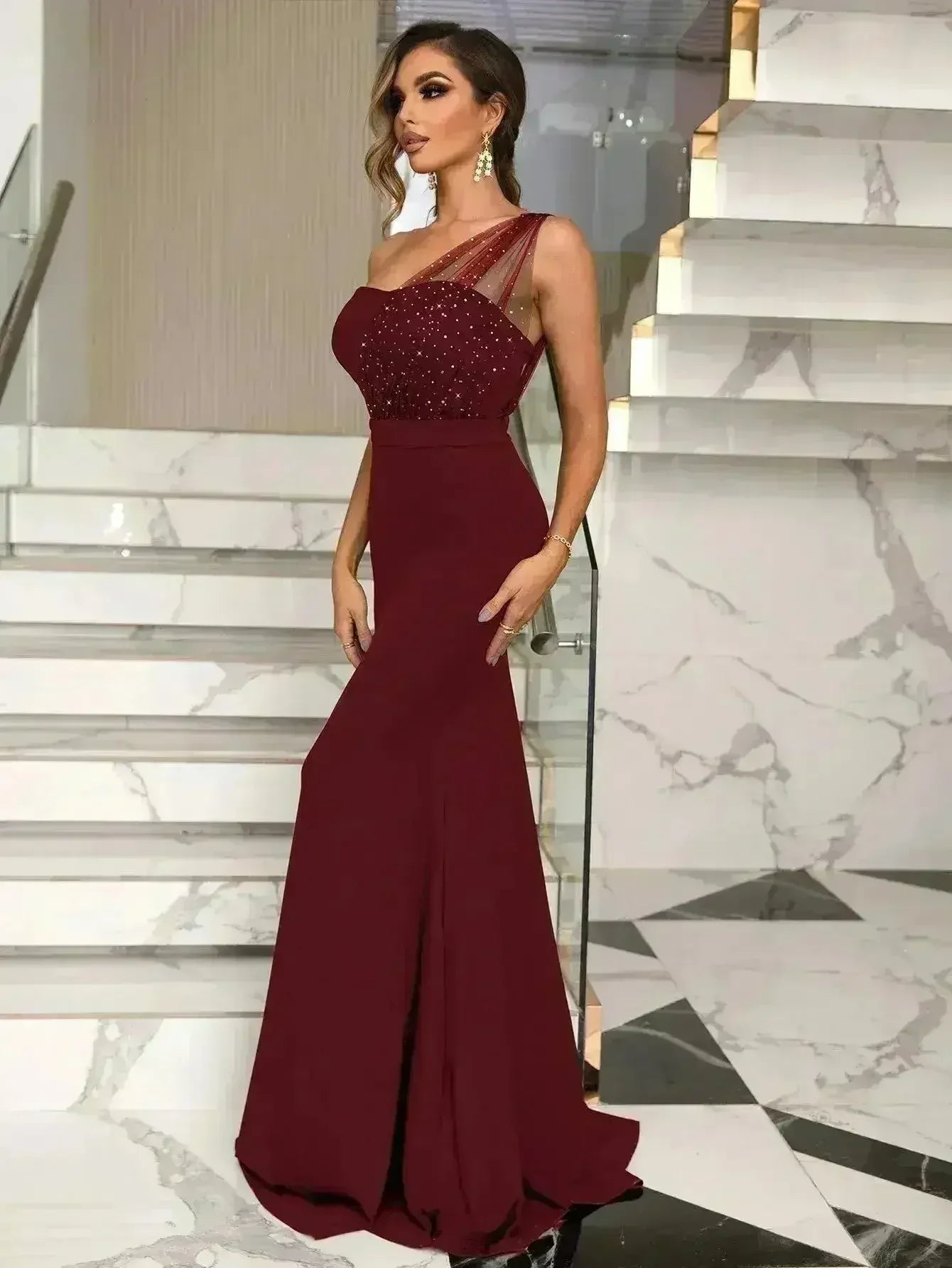 Femstylo women's rhinestone one-shoulder formal dress, elegant evening gown with sparkling details and flowing fabric.