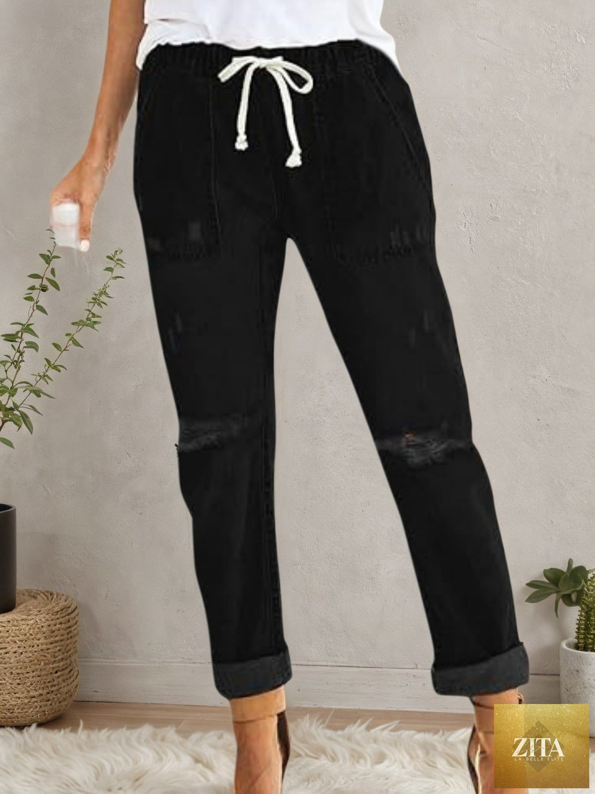 Women’s distressed stretch jeans by FitiqueFit featuring casual elastic waist denim joggers with a relaxed fit and distressed details.