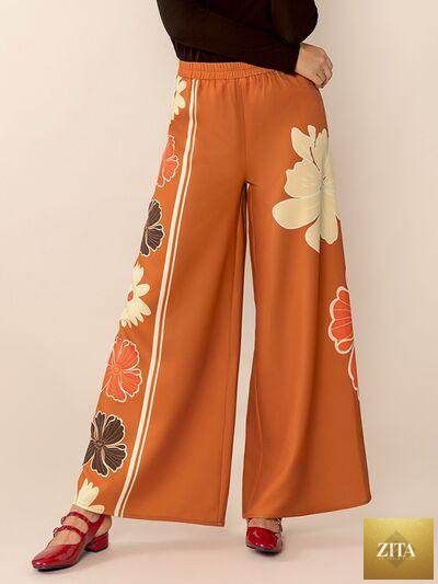 Selvanelle printed elastic waist wide-leg pants with comfortable fit, featuring a stylish floral pattern and flowy silhouette.