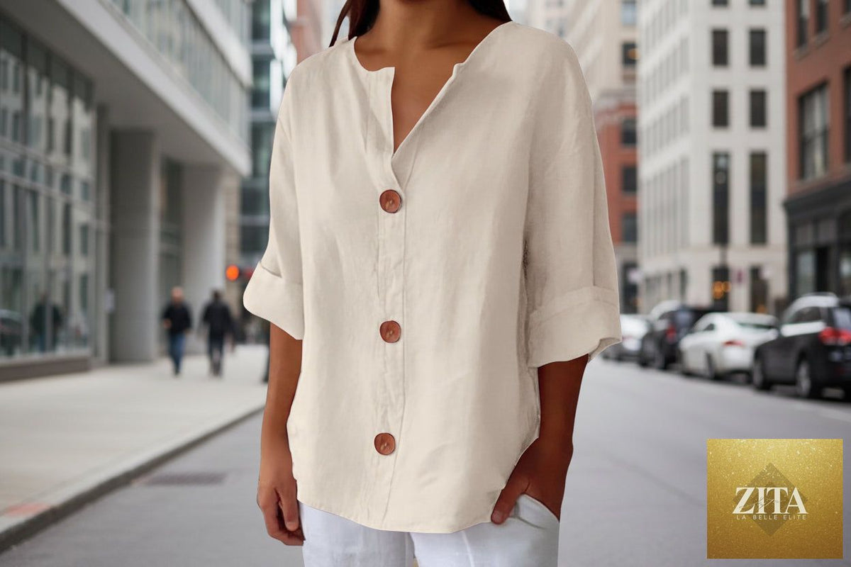 Women's V-neck cotton linen buttoned blouse by FitiqueFit, featuring a casual style with long sleeves and a relaxed fit.
