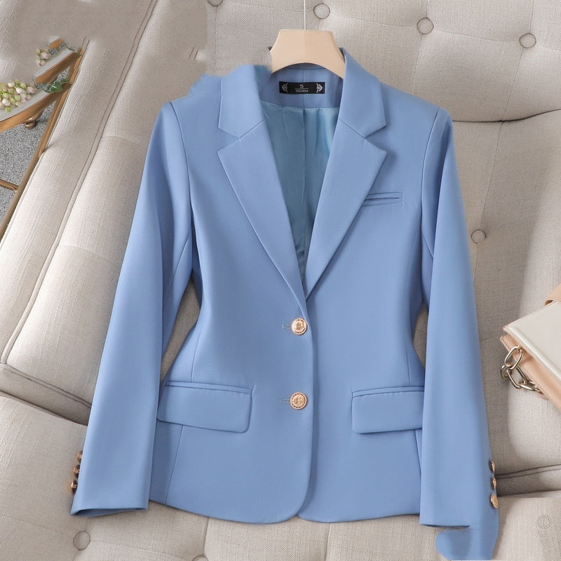 Professional women's suit and overalls by Zita La Belle Elite, featuring a tailored formal coat and matching smart attire.