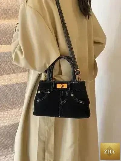 Femstylo stylish suede handbag with adjustable strap and dual-use design, featuring a sleek, modern look for versatile carry.