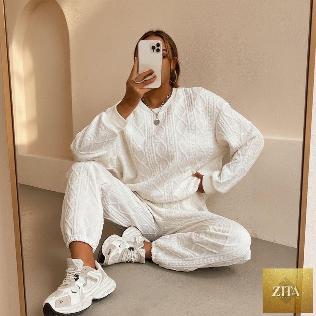 Women's cable-knit texture sweatshirt and jogger pants set by MERIDGE, showing a cozy knit top with matching relaxed-fit joggers.