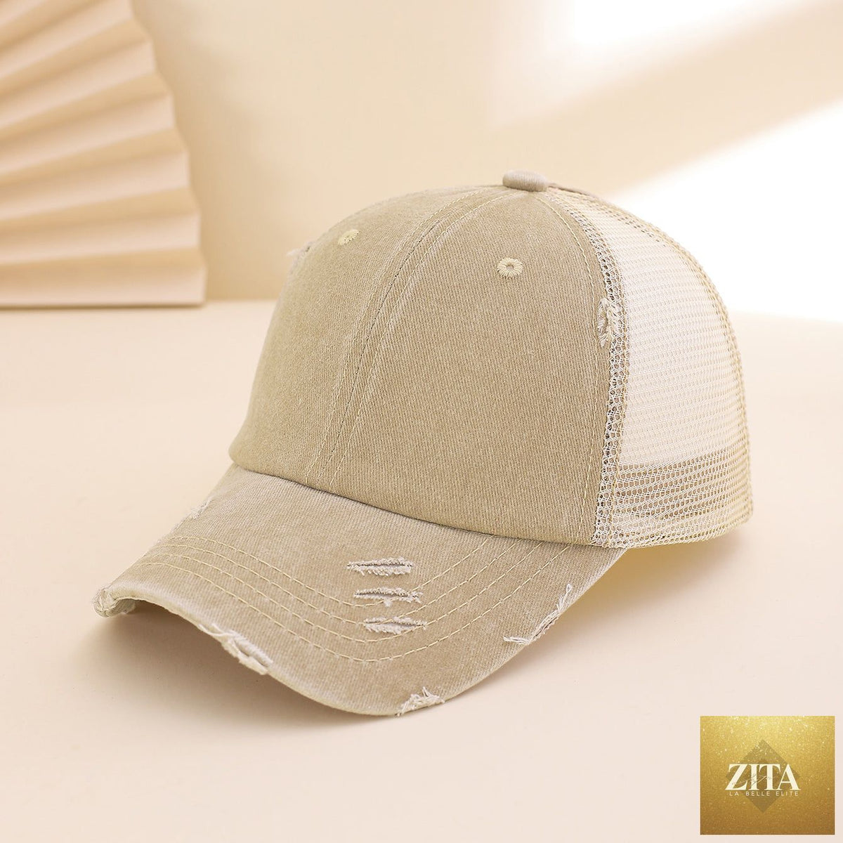 Distressed washed mesh baseball cap by Zita La Belle Elite with frayed edges, unisex design, perfect for outdoor and daily wear.