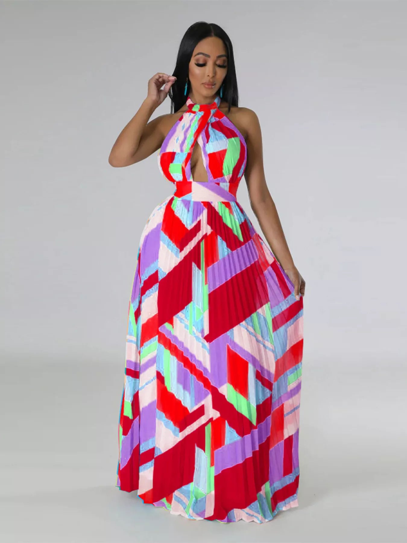 Halter neck geometric print pleated maxi dress from Shopiebay featuring a flowing design and bold pattern.