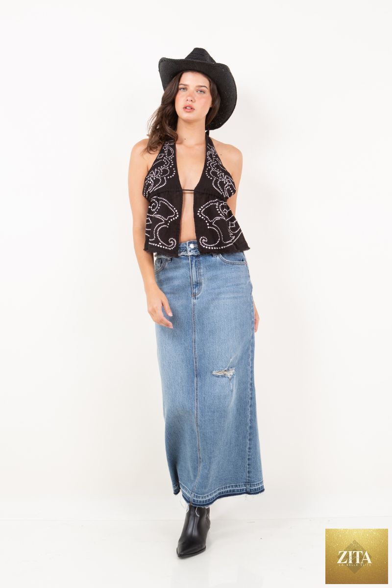 Livia Denim Maxi Skirt by Artemis Vintage featuring a frayed waistband and slit detail, styled with casual accessories.