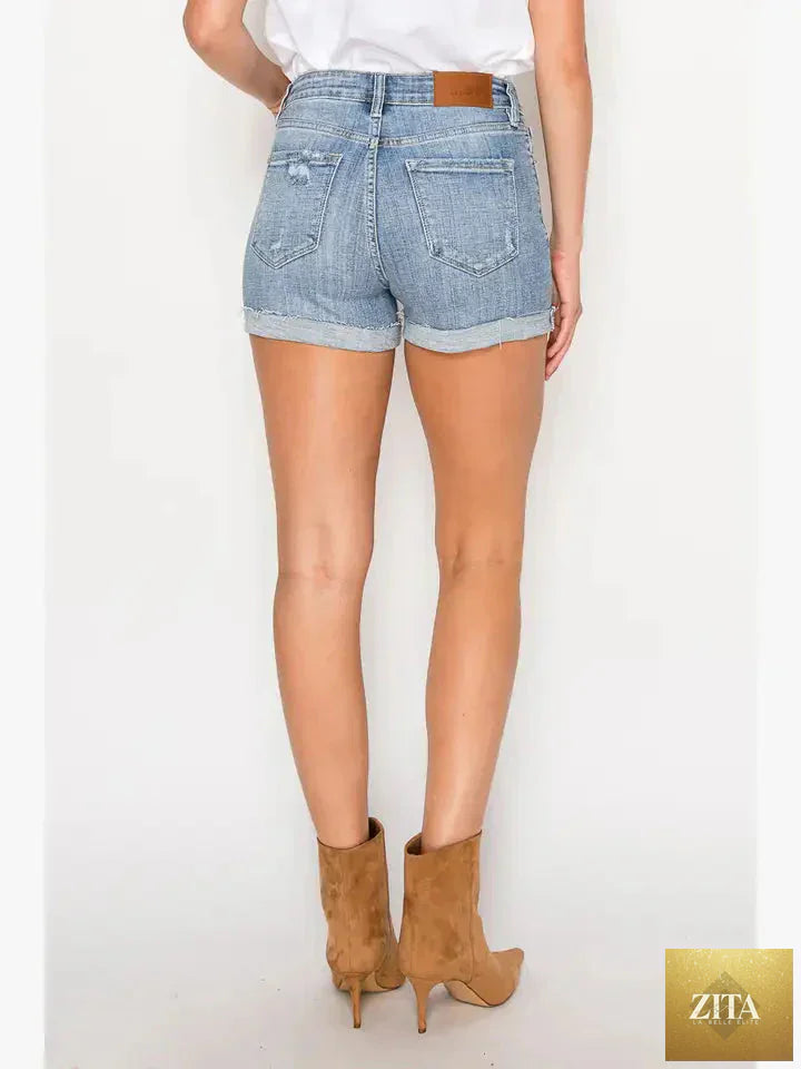 Artemis Vintage Kathy high rise cuffed stretch shorts in denim, shown with rolled cuffs and a fitted waist.