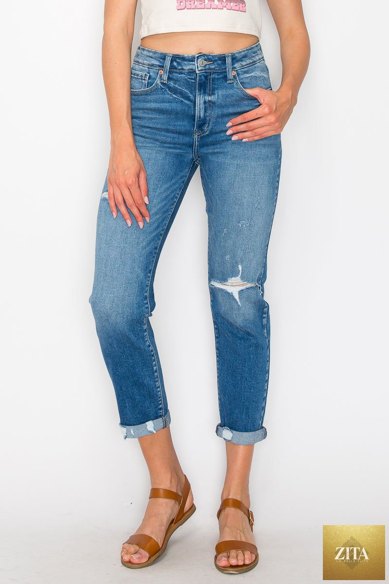 Artemis Vintage Alexa high-rise tapered leg mom jeans with classic denim wash and detailed stitching on a white background