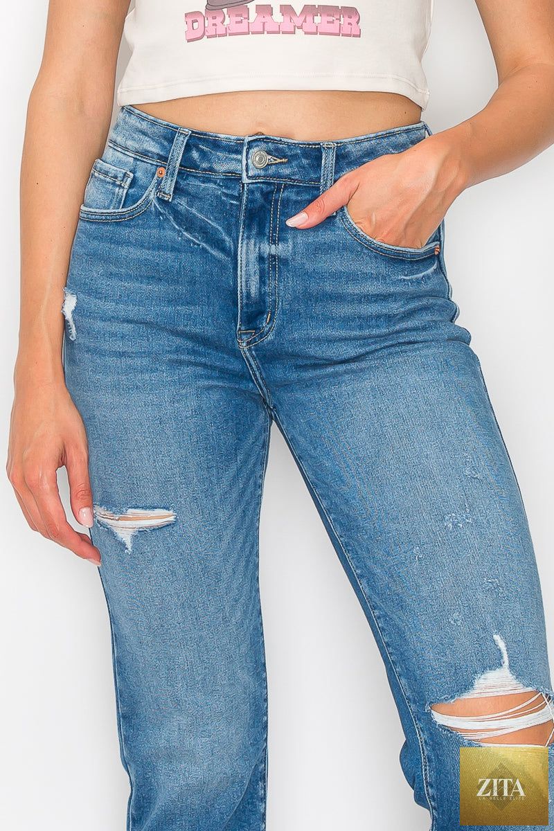 Artemis Vintage Alexa high-rise tapered leg mom jeans showing a close-up of the denim fabric and classic five-pocket design.