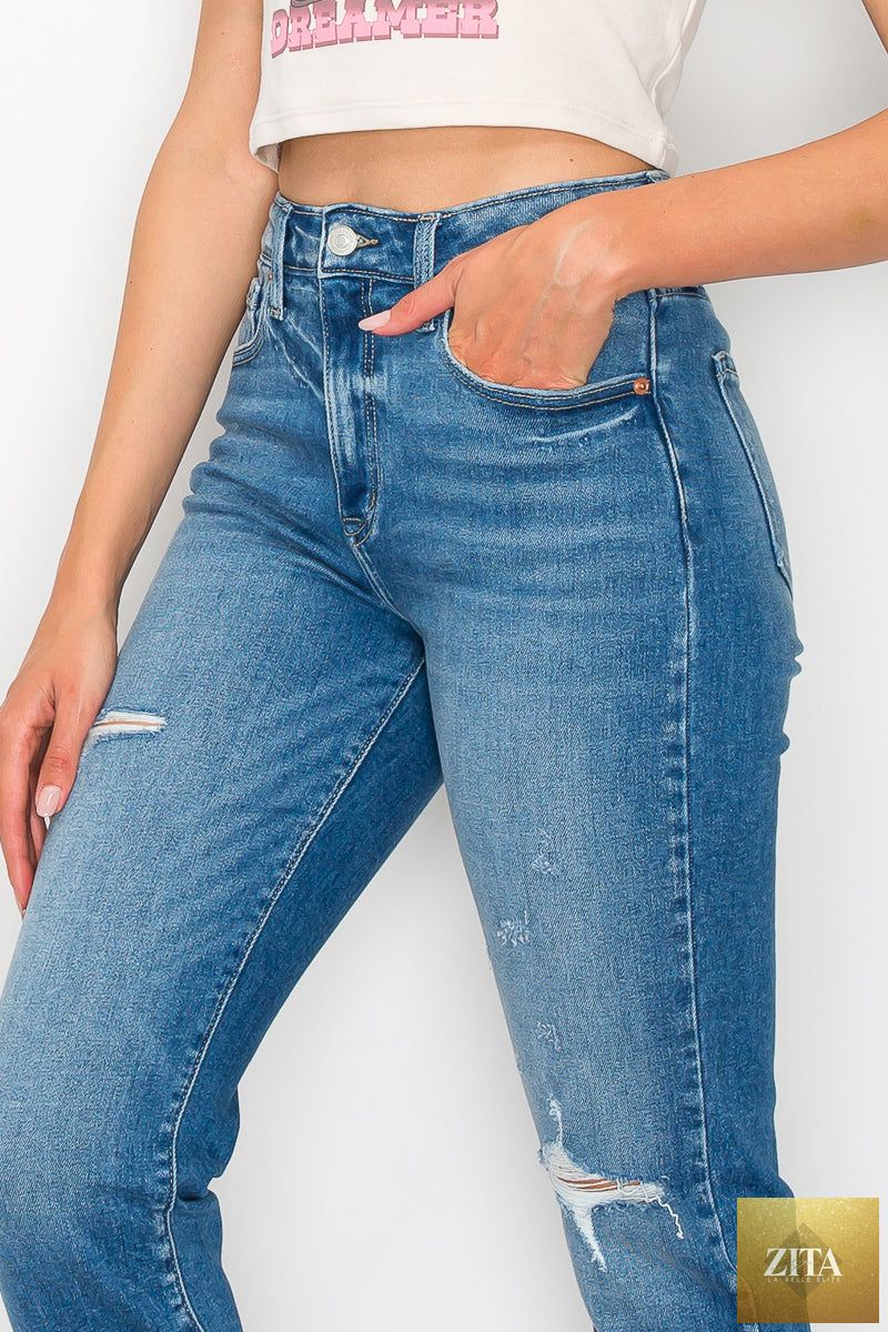 Artemis Vintage Alexa high rise tapered leg mom jeans displayed on a model, showcasing classic denim style and fit