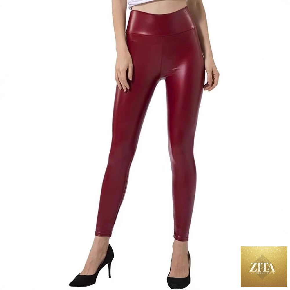 Black leather pants for women, form-fitting and versatile, showcasing a sleek design with a high waist and smooth finish.