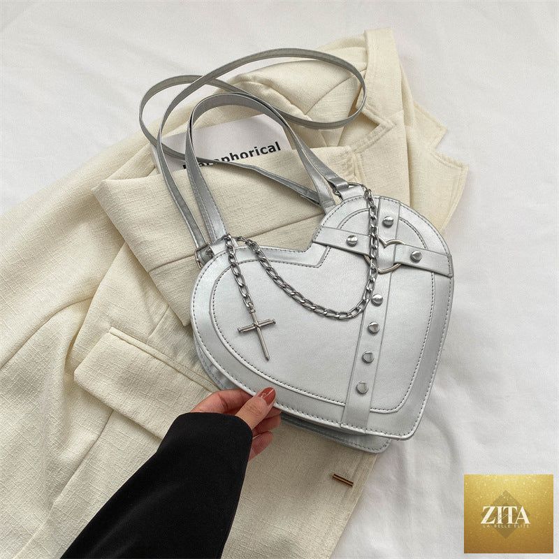 Korean-style cute heart-shaped shoulder crossbody bag with niche design, featuring a compact size and soft pastel colors.