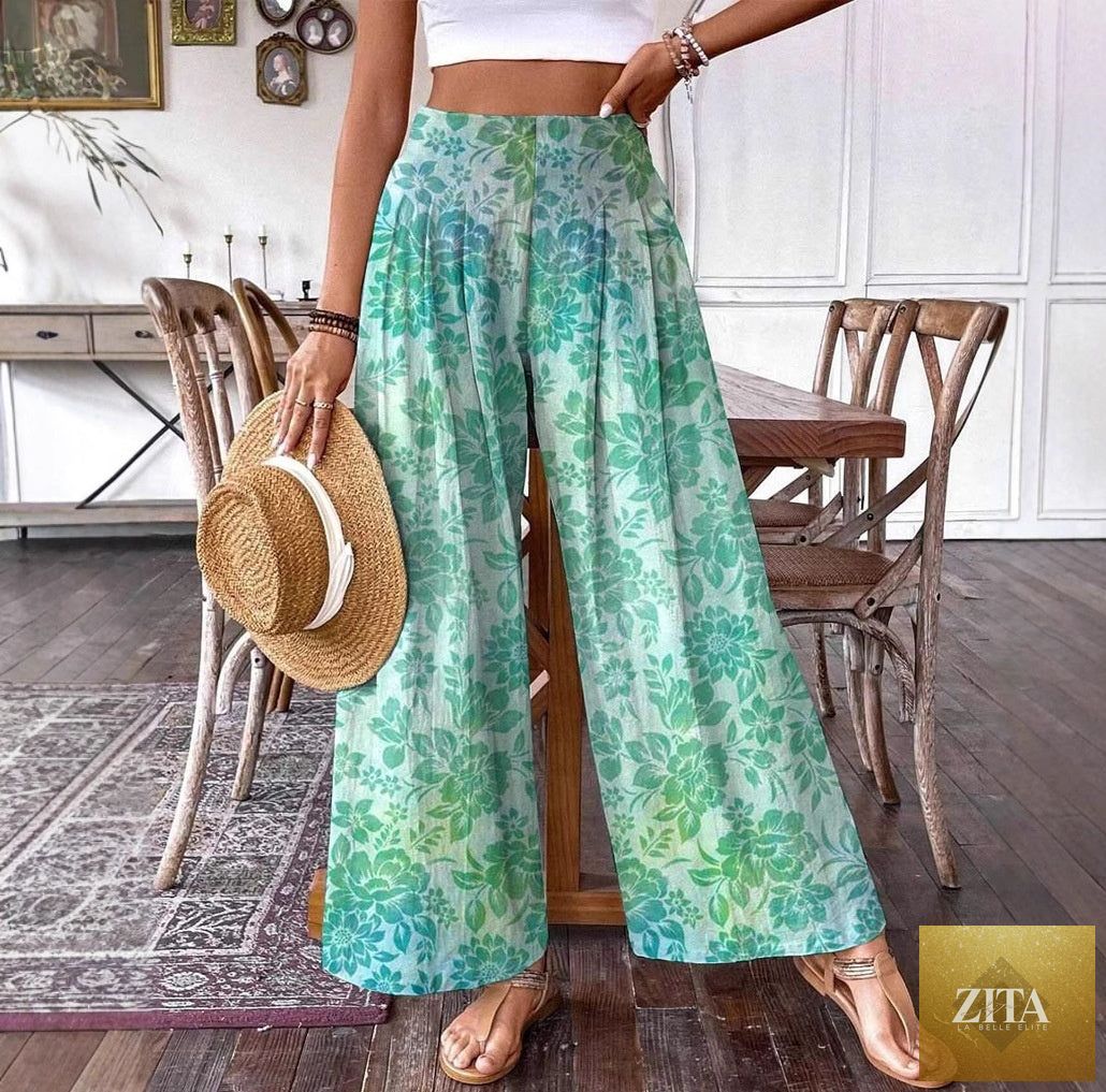 Plus-size women's casual wide-leg denim athletic pants with a relaxed fit and slim design, shown in a natural pose.