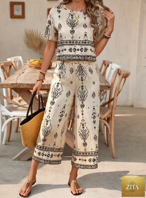 Women's ethnic print contrast two-piece casualwear set by Zita La Belle Elite, featuring a top and straight-leg pants.