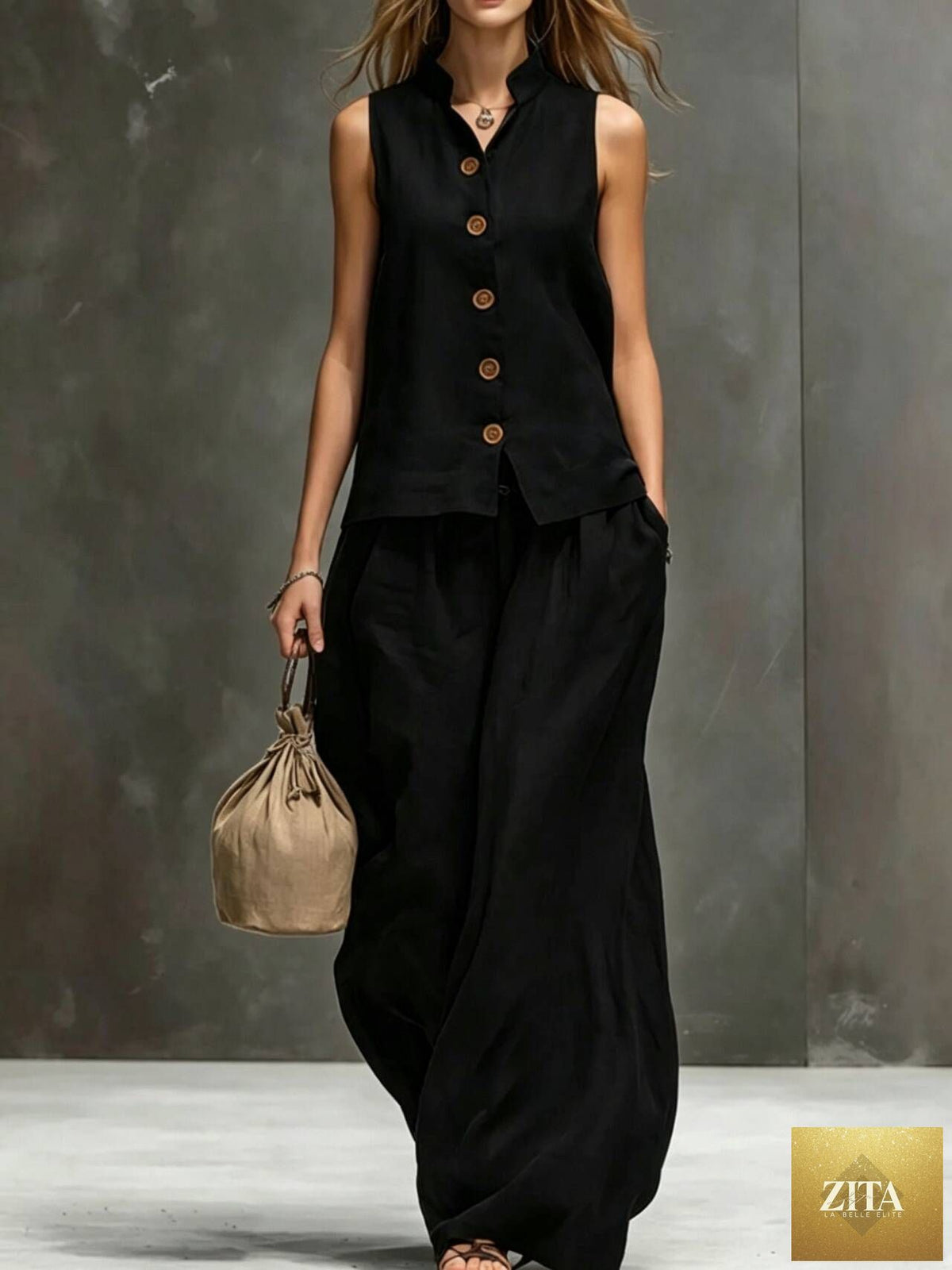 Women’s sleeveless vest and wide-leg pants two-piece set in cotton linen by Zita La Belle Elite, featuring a casual, stylish look.