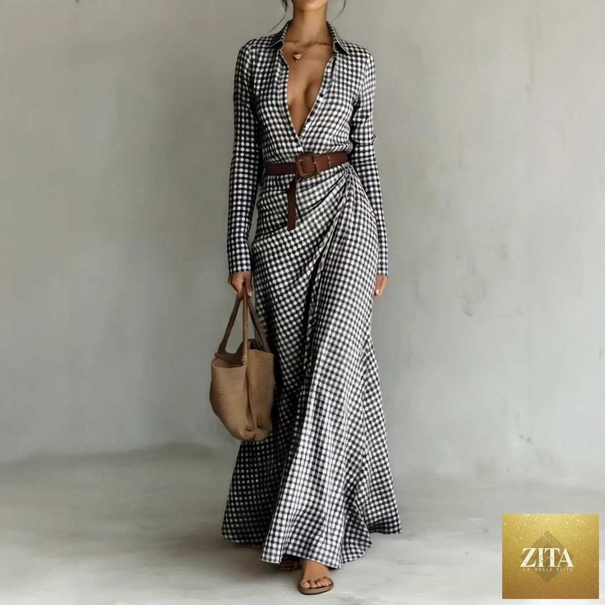 Women's belted irregular pleated dress by FitiqueFit featuring a stylish design with a waist belt and flowing pleats.