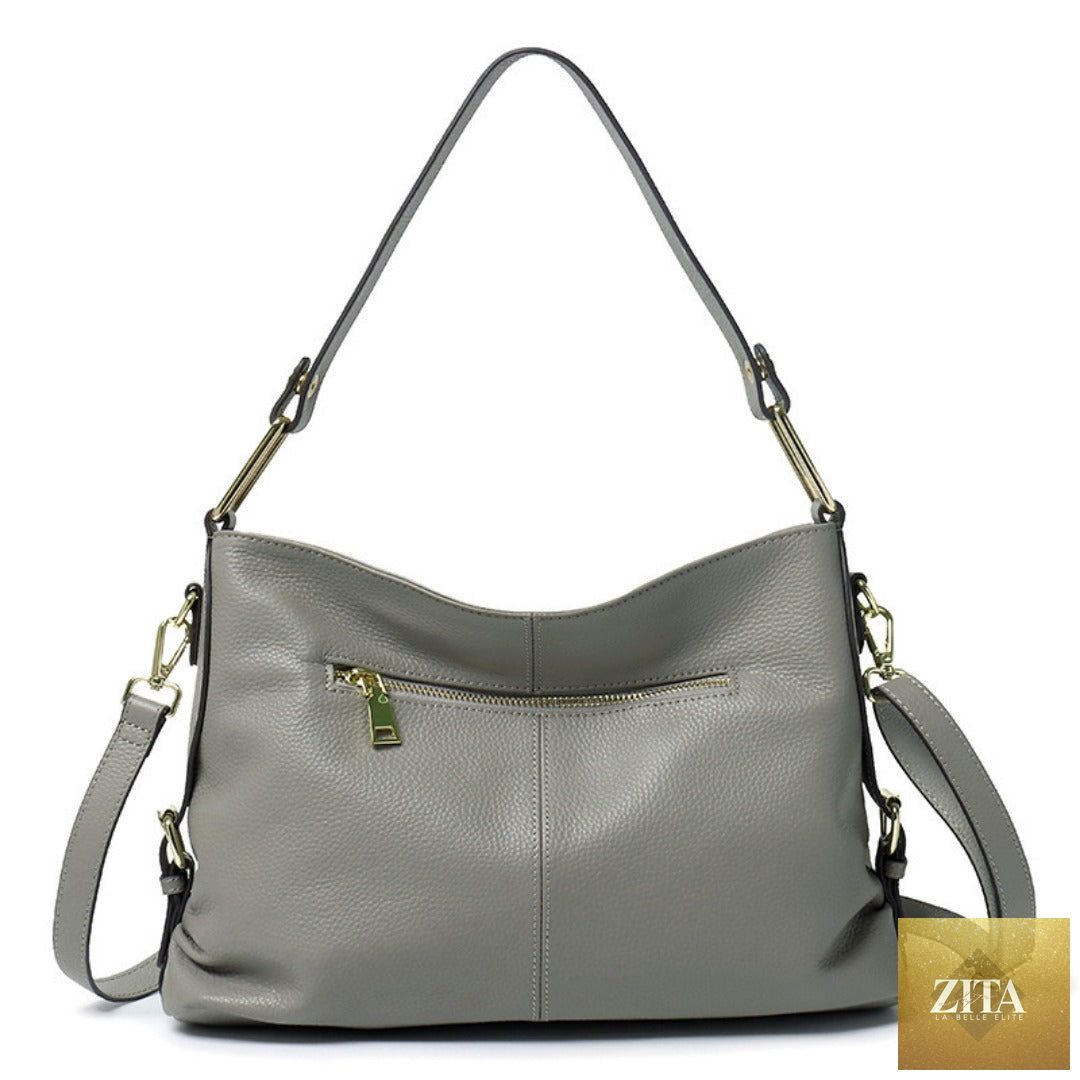 Elegant genuine leather handbag by SHOMICOBOUTIQUE featuring a stylish hobo and crossbody tote design in classic leather.