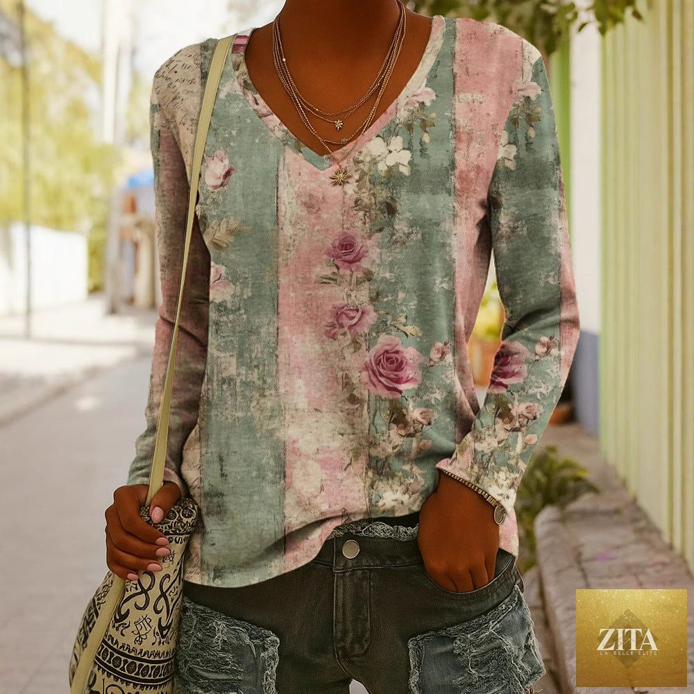 Women's ethnic print V-neck long-sleeve pullover top by Zita La Belle Elite, featuring colorful patterns and a relaxed fit.