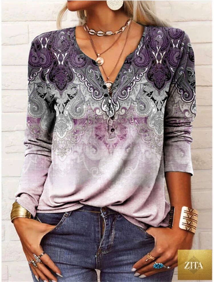 Women's ethnic print V-neck long sleeve casual T-shirt by Zita La Belle Elite, loose fit with vibrant traditional design.
