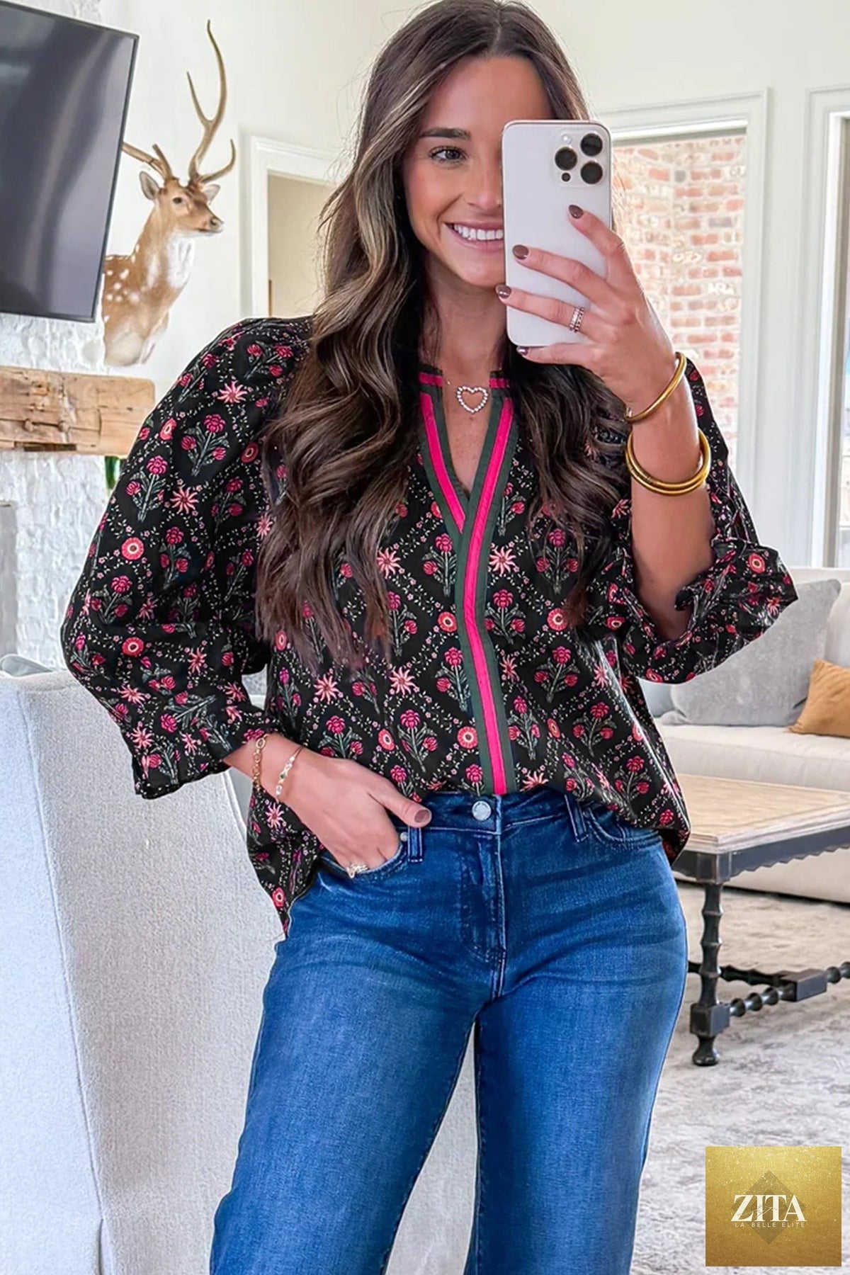 Black Vintage floral blouse with contrast V-neckline and bracelet sleeves, featuring a stylish, feminine top from Wild and Free Boutique.