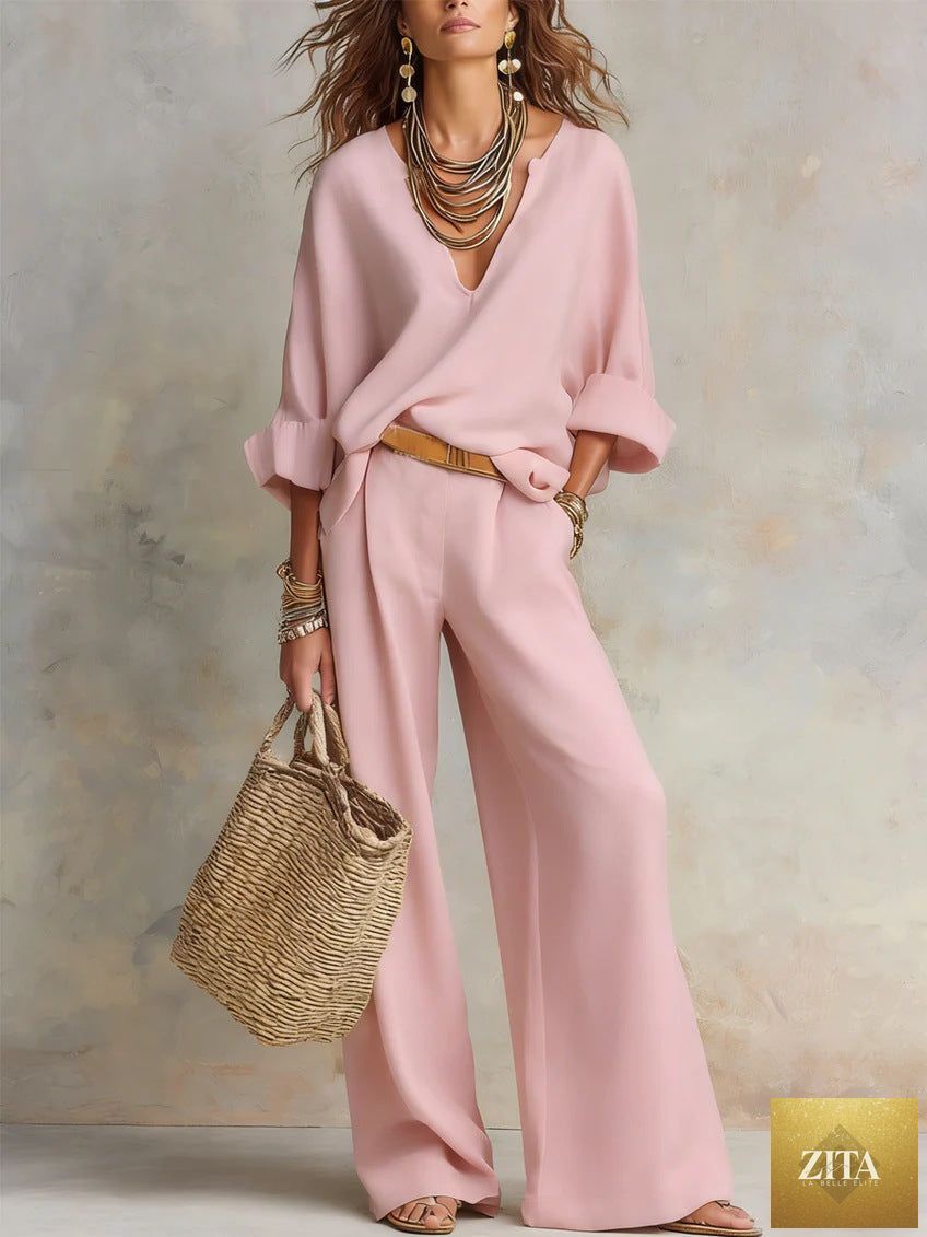 Women's casual linen vacation set by Zita La Belle Elite, featuring a three-quarter sleeve top and full-length pants.